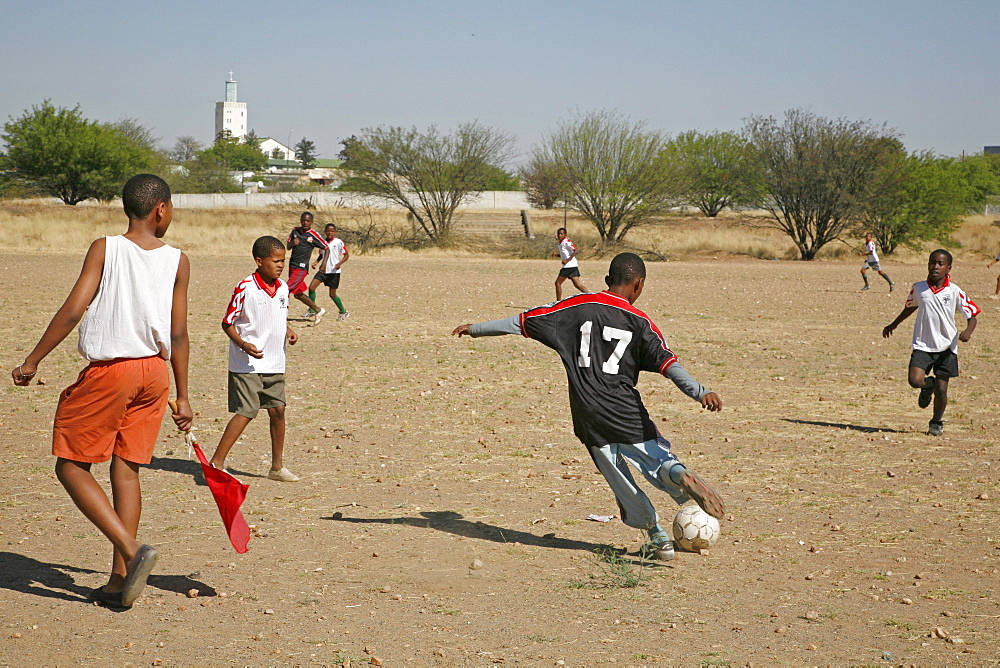 Namibia bernard nordkamp (youth) center, katatura, a black township of windhoek, dating from apartheid. Playing football