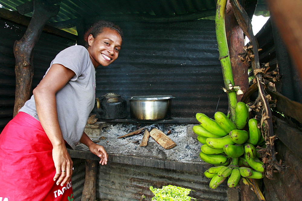 Fiji paulini mateyawa, 23, in kitchen, qelena village, taveuni photo by sean sprague