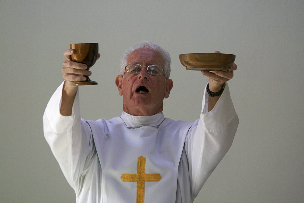 Jamaica. American priest celebrating sunday mass at catholic church in chester castle