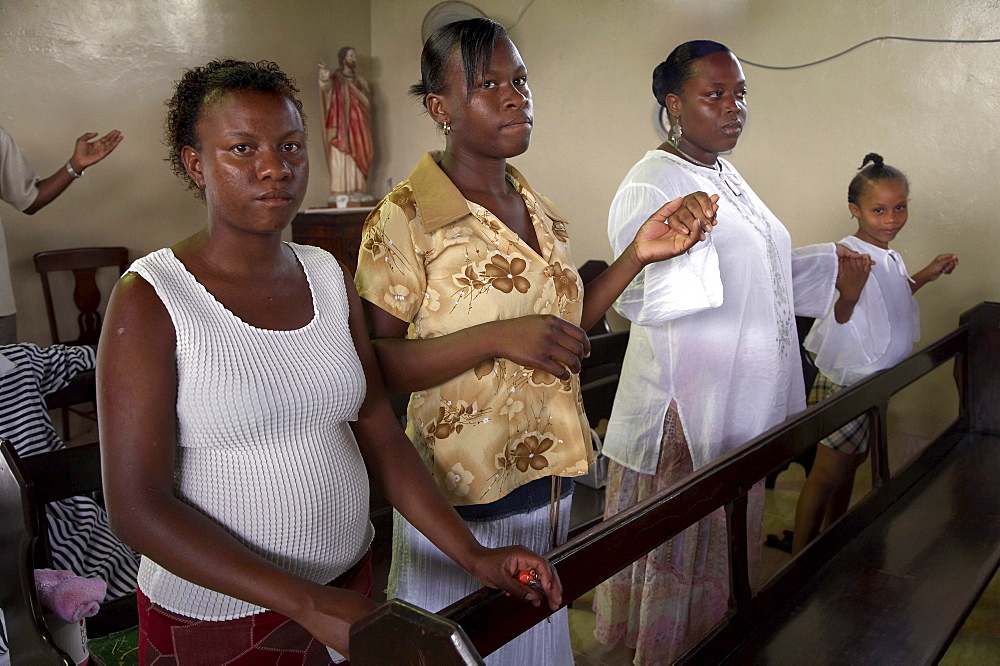 Jamaica. Congregation during sunday mass in the catholic church at seaford town