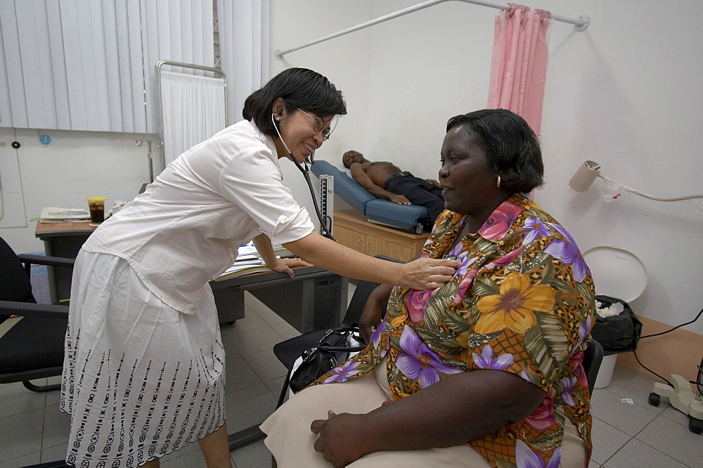 Jamaica. Doctor examining patient in clinic at montego bay