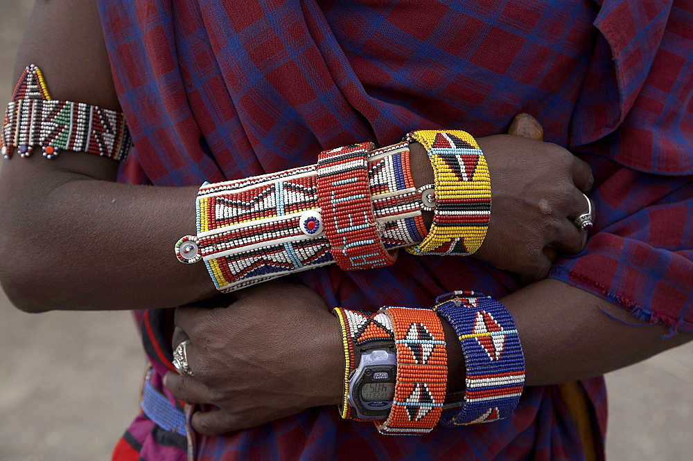 Kenya. Details of beads and watch worn by masai man at a masai village within the amboseli national park. Photo by sean spragu