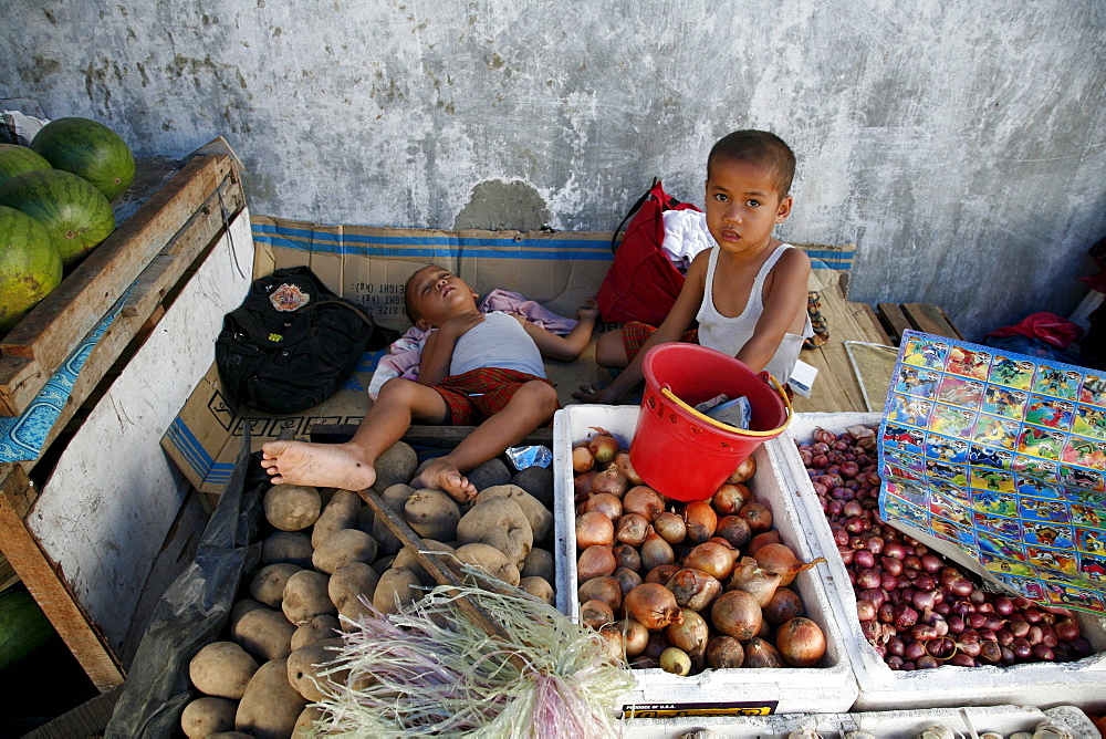 Indonesia children of hoddi, market trader. banda aceh, aceh. 2 years after the tsunami