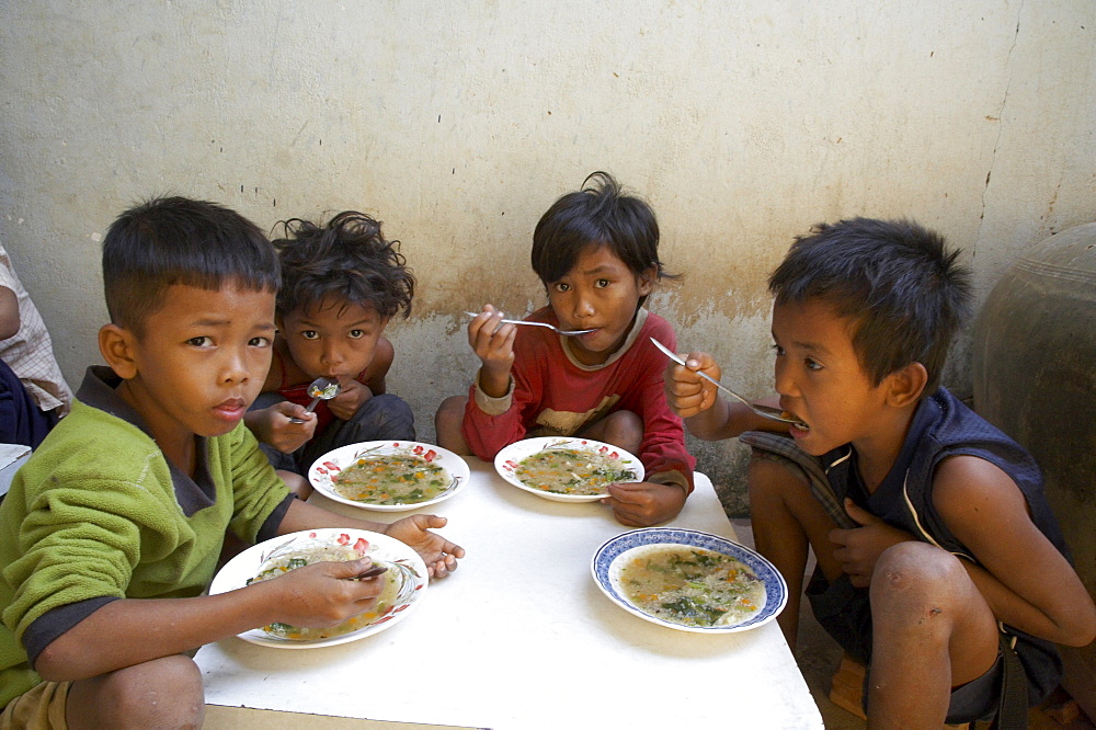 Cambodia lunch time at the childrens center in anlon kgnan