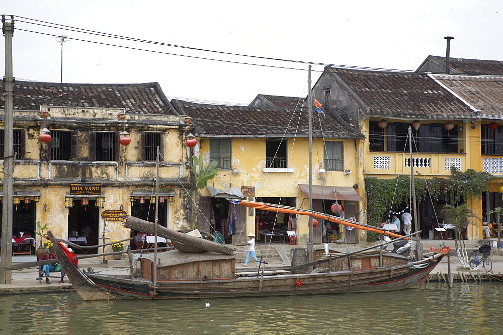 Vietnam river, boat and old houses, hoi an