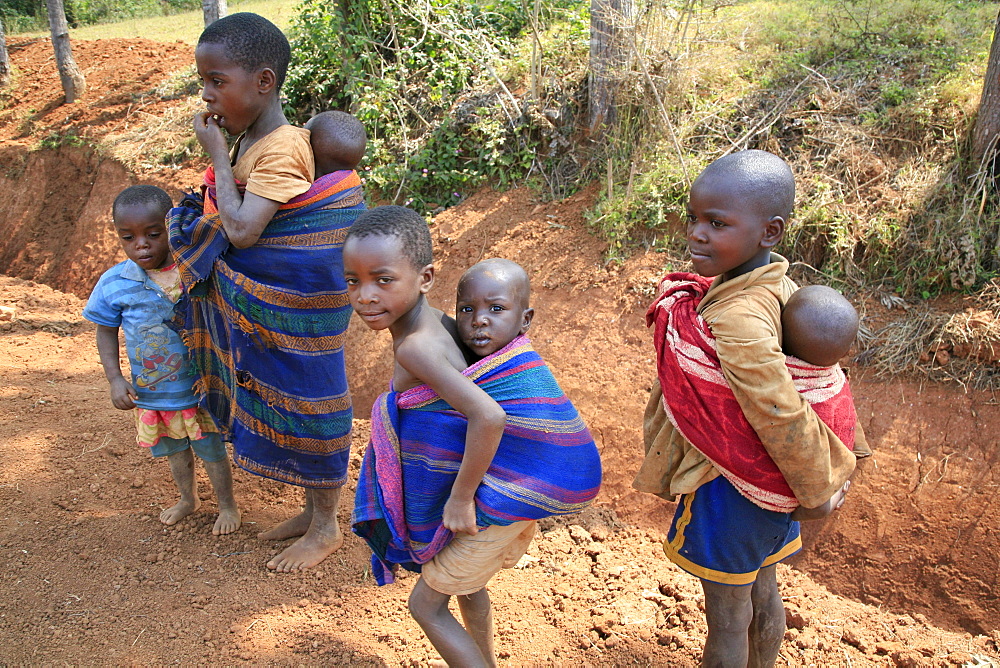 Burundi small children carrying even smaller children. Gitera.