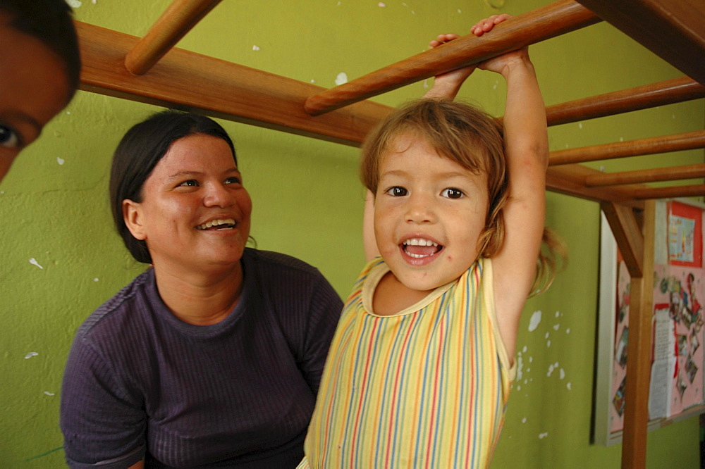 Colombia mother relating to her child at a day care and child stimulation center run by dni (international defence of children) in barrancabermeja