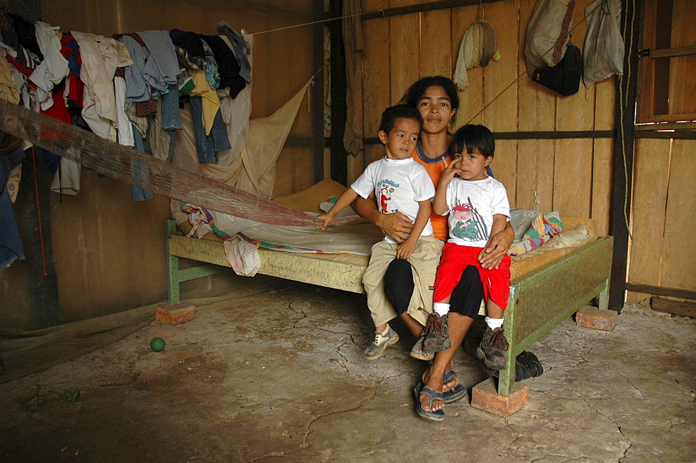 Colombia very poor mother with her two sons, barrancabermeja