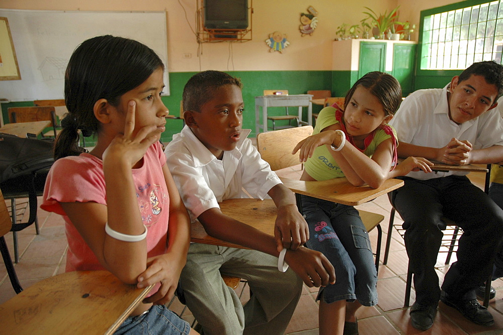 Colombia extra-curricular seminar in a middle school at la paz, barrancabermeja, in which children discuss violence in their community, and their personal experiences. Many had witnessed killings and dead bodies at close range. The seminars are organised by dni, international defense of children. Their town is one of the most violent in colombia