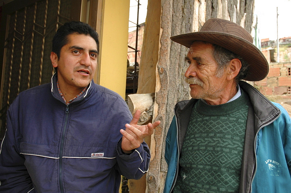 Colombia social worker visits slum dwellers, altos de cazuca, bogota