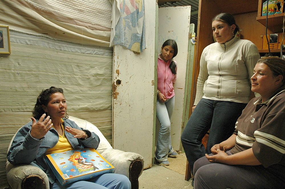 Colombia social worker visits slum dwellers, altos de cazuca, bogota