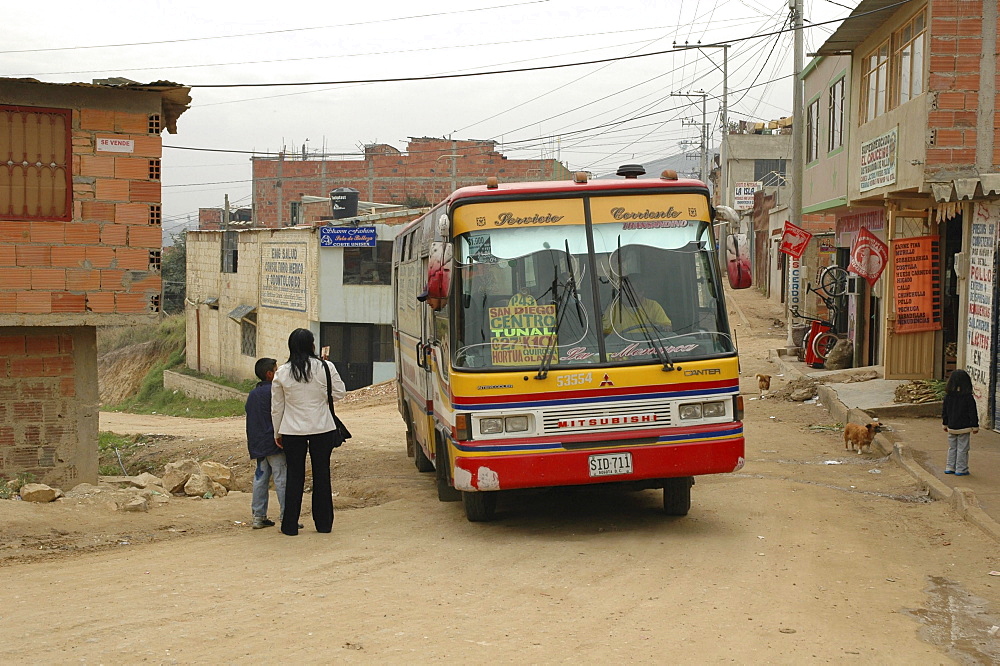 Colombia city bus in the slum development at altos de cazuca, bogota