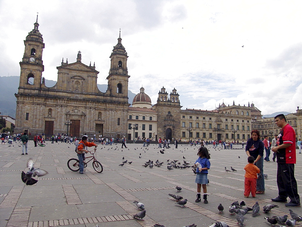 Colombia sunday in la candelaria, bogota, when the streets are closed to motor traffic and opened for cyclists until 2 pm. Santa clara cathedral in the plaza bolivar