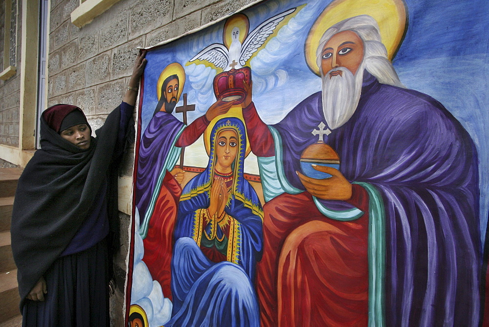 Ethiopia nun with painting she made of mary mihur eyesus orthodox monastery, gurage