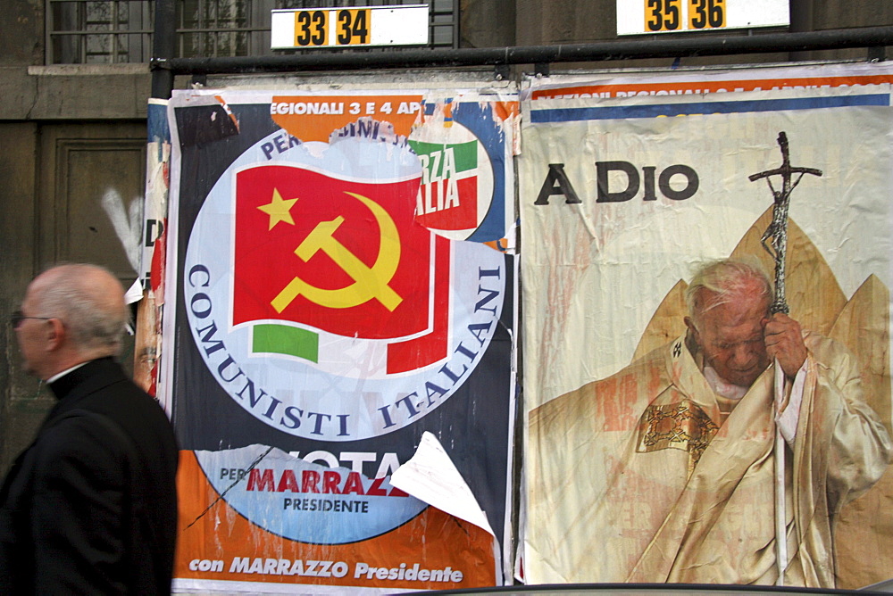 Italy the funeral of pope john paul ii at the vatican in rome, 8th april 2005. Two posters in rome: one for the pope, the other for the communist party