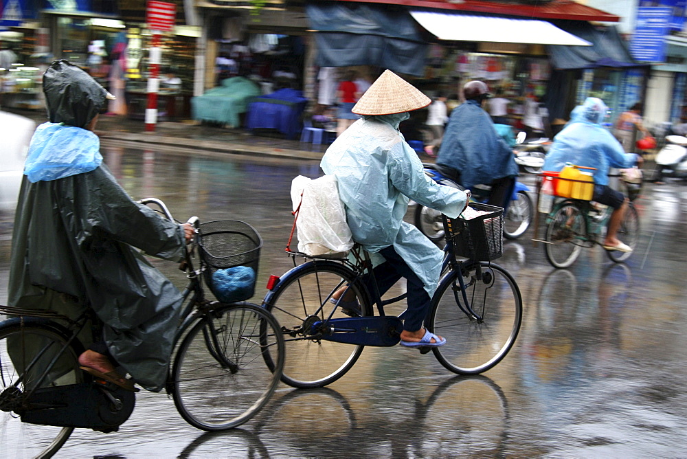 Vietnam street scene in hanoi with heavy traffic, especially bicycles and motorcycles