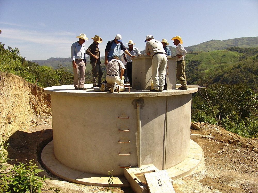 Honduras local community members working on a new water system for their village. Agua caliente, near copan