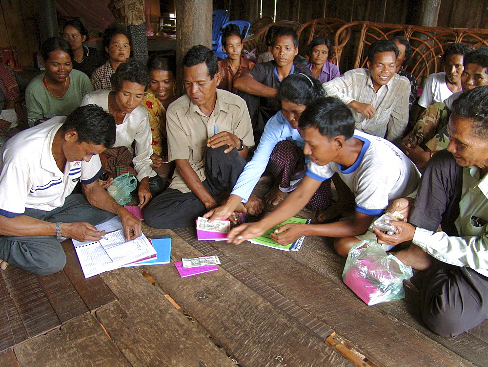 Cambodia savings club and micro credit group holding a meeting, kampong thom