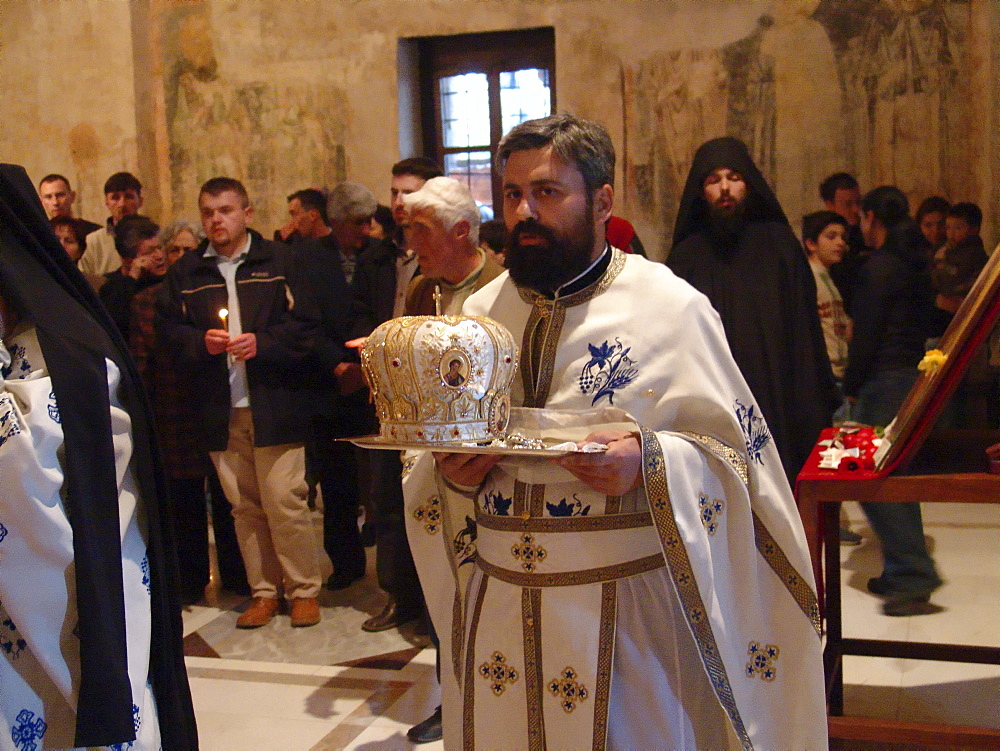 Macedonia (the former yugoslav republic of macedonia, fyrm) carrying the bishops crown. Easter sunday service at saint sofia orthodox church, ohrid. Mass is lead by archbishop timotei