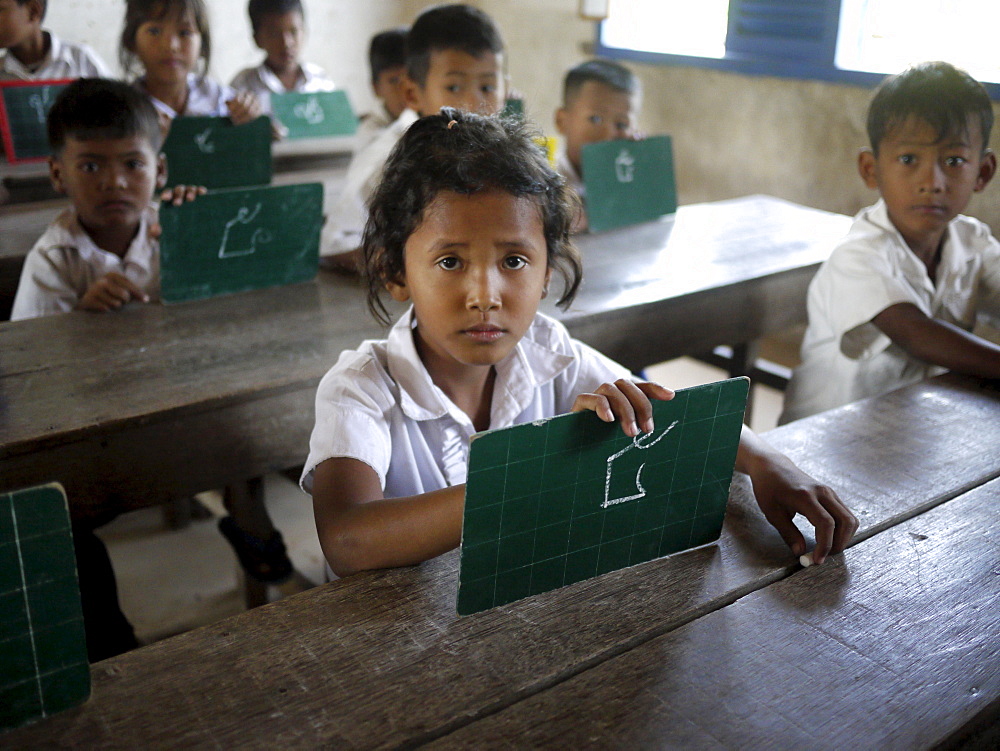 CAMBODIA Village primary school. Inclusive education: CRS works with local education authorities to include children with physical disabilities in regular classrooms. Teachers will receive special training. Ang Soukliang primary school, Prey Neang Puon village, Chum Reas Pen commune, Sam Roang District, Takeo Province. PHOTO by Sean Sprague