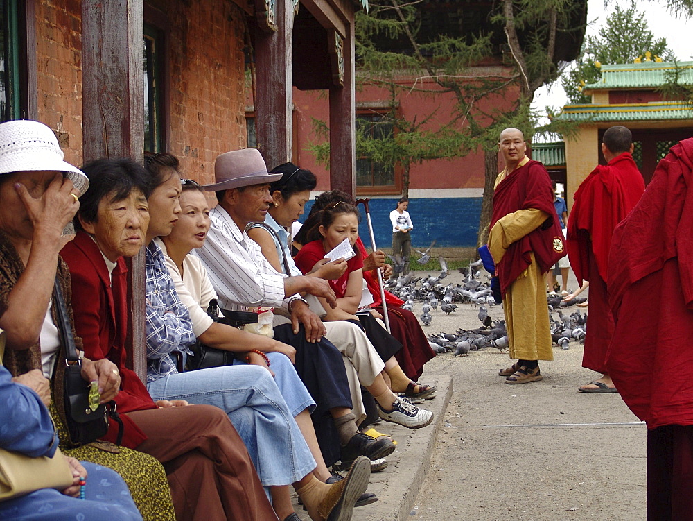 Mongolia visitors and buddhist monks, gandan monastery, ulaan baatur. Main gate