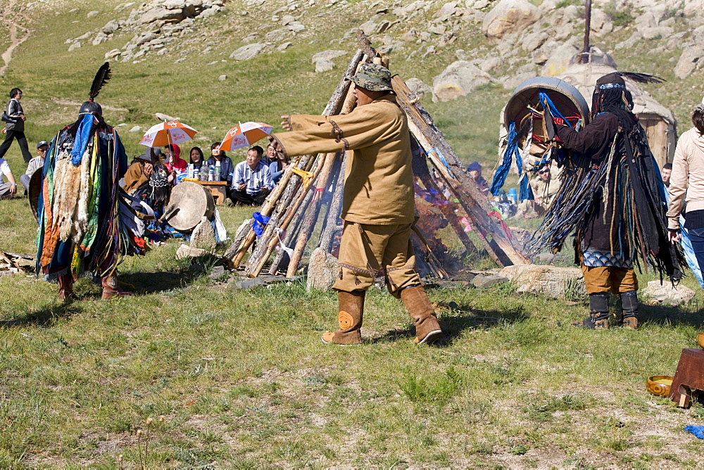 Invocation of the tengir (celestial) forces by means of drumming and dance. Like the sun, fire is a the shamans often wear a ?light-protecting visor? Over their eyes. The radiance of the celestial spirits can be extremely strong, and this protects the onlookers from the blast of light when the celestial spirits enter the body of the shaman. 13th century national park, tov province, mongolia. 13th century national park comprises chinggis khan's giant statue museum and live museum "town from 13 century". The ancient nomadic mini kingdom is located in the distance of 130 km east of ulaanbaatar in area of erdene zuu of tov province. It takes 2 hours driving on paved road. In the live 13th century kingdom one will see and experience the authentic lifestyle of mongols, who were lived in powerful mongol empire?s Period. This place gives you a same feeling that famous traveler marco polo and william rubruck felt once upon time