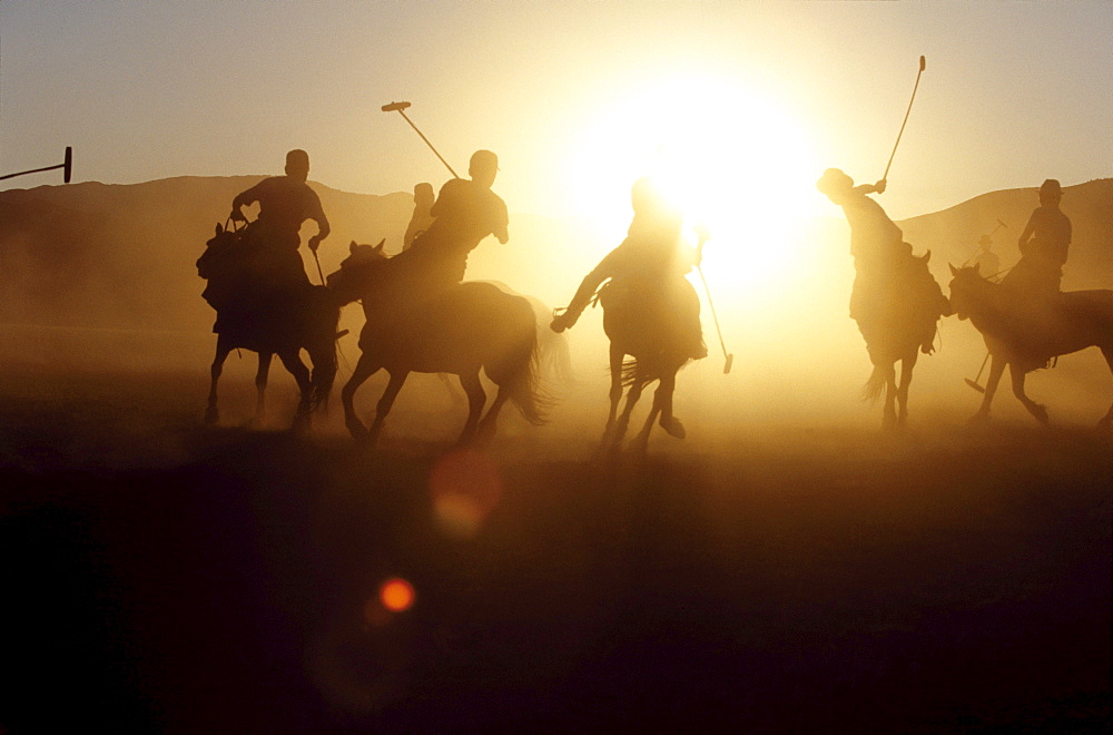 In the 13th century, the golden age of the mongol empire, a sport resembling polo became a training game for the mongolian cavalry throughout high asia. horsemen learned to bend low at speed, like acrobats to finish off fallen enemies with sabres, looting their prey on the ground by scooping up jewels that caught their eye. there are stories, too, of genghis khan knocking about an enemys head as if it were a ball. orkhon valley, central mongolia