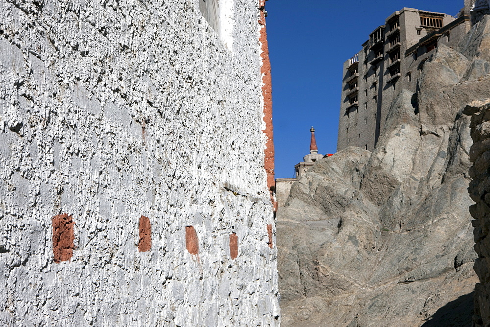 Buildings are painted with the color red which has the power to protect from the malevolent tsan spirits. Ladakh, India