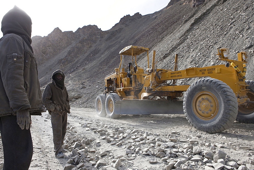 The road, for the most part, is a painstakingly handmade affair built and maintained by labourers from bihar state of india. They are subjected to excruciating and extremely dangerous working conditions. The workers are woefully ill-equipped and under-dressed and although the army purports to lend them winter clothing suitable for the extremity of the weather at these altitudes, many of the workers were visibly suffering from the cold. Ladkha, india