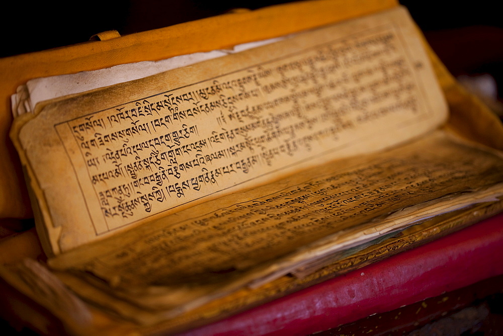 Prayer book of a monk in Dolma Lakhang in Spituk Monastery. Ladakh, India