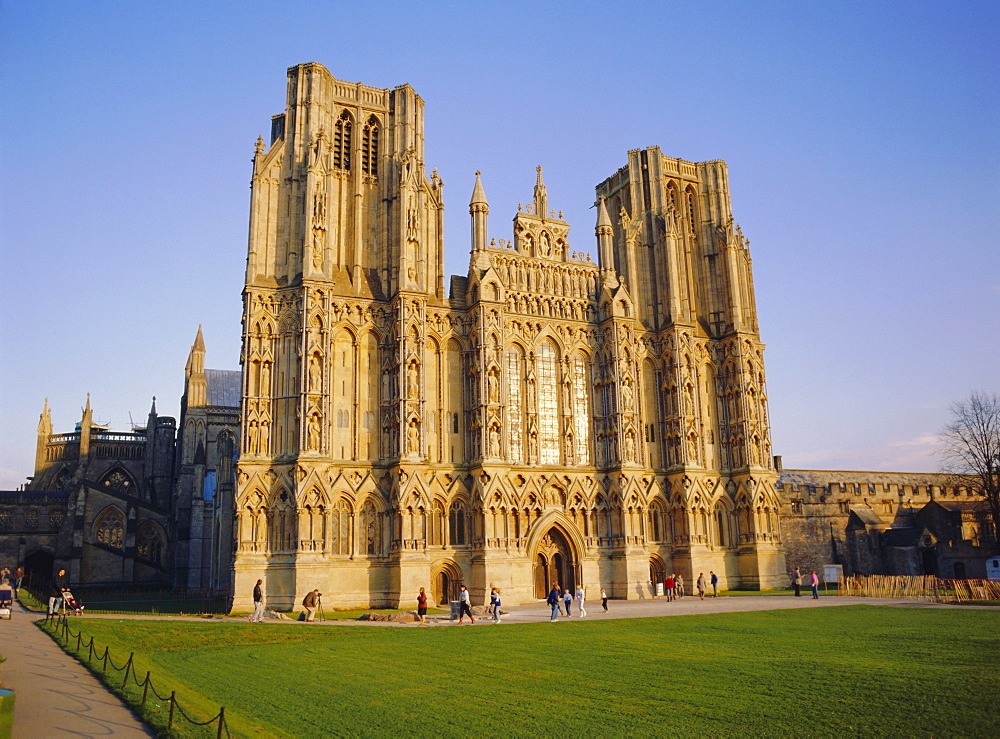 The West Front of the Cathedral, in late autumn sun, Wells, Somerset, England, UK