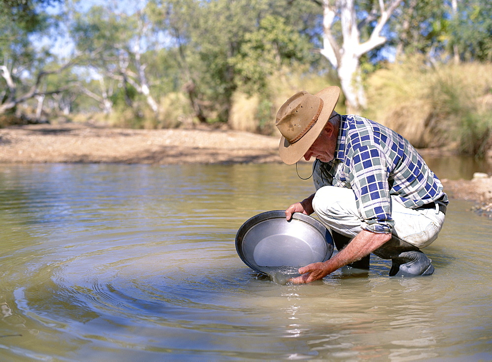 Elderly man panning for gold, Elvire River, Old Halls Creek, Kimberley, Western Australia, Australia, Pacific