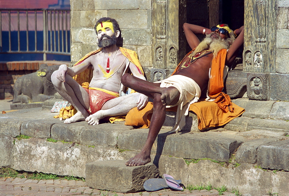 Holy men posing for photos Pashupatinath Temple, Kathmandu, Nepal, Asia