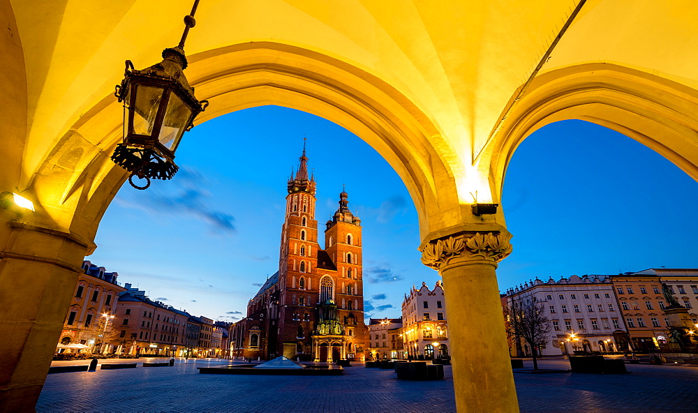 St. Mary's Church (St. Marys Basilica) and main square illuminated at dawn, UNESCO World Heritage Site, Krakow, Poland, Europe