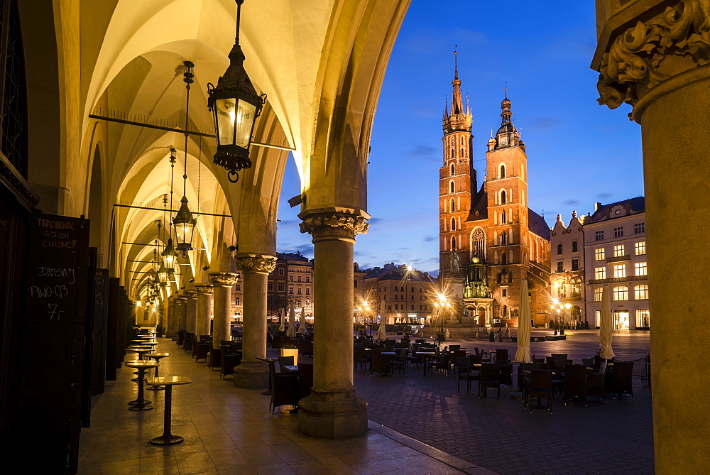 St. Mary's Church (St. Marys Basilica) and main square illuminated at dawn, UNESCO World Heritage Site, Krakow, Poland, Europe