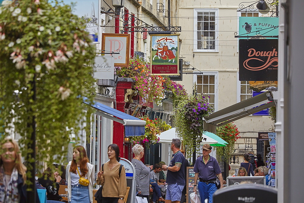 Historic architecture and a street scene in the historic heart of Bath, Somerset, England, United Kingdom, Europe