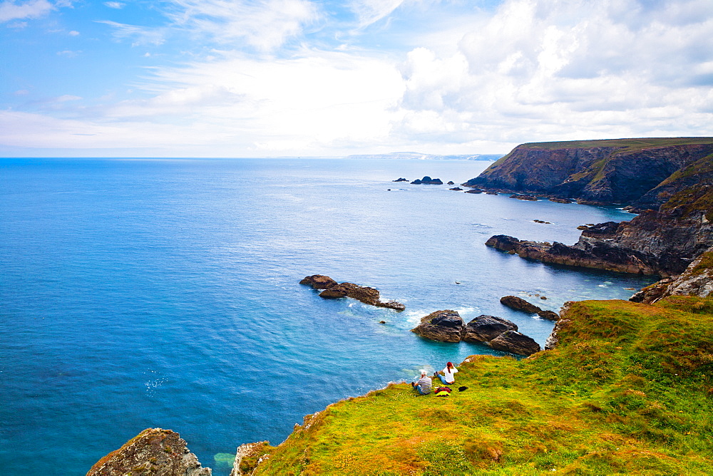 Couple on cliff top, Godrevy, Cornwall, England, United Kingdom, Europe