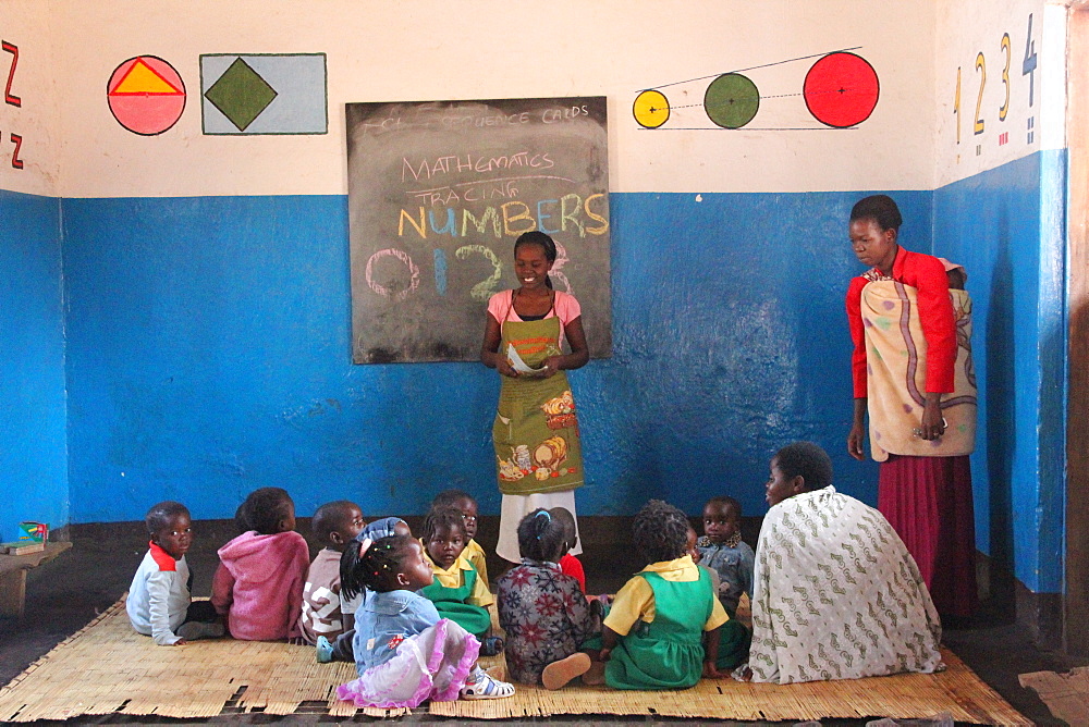 Small children and teacher, Malawi, Africa