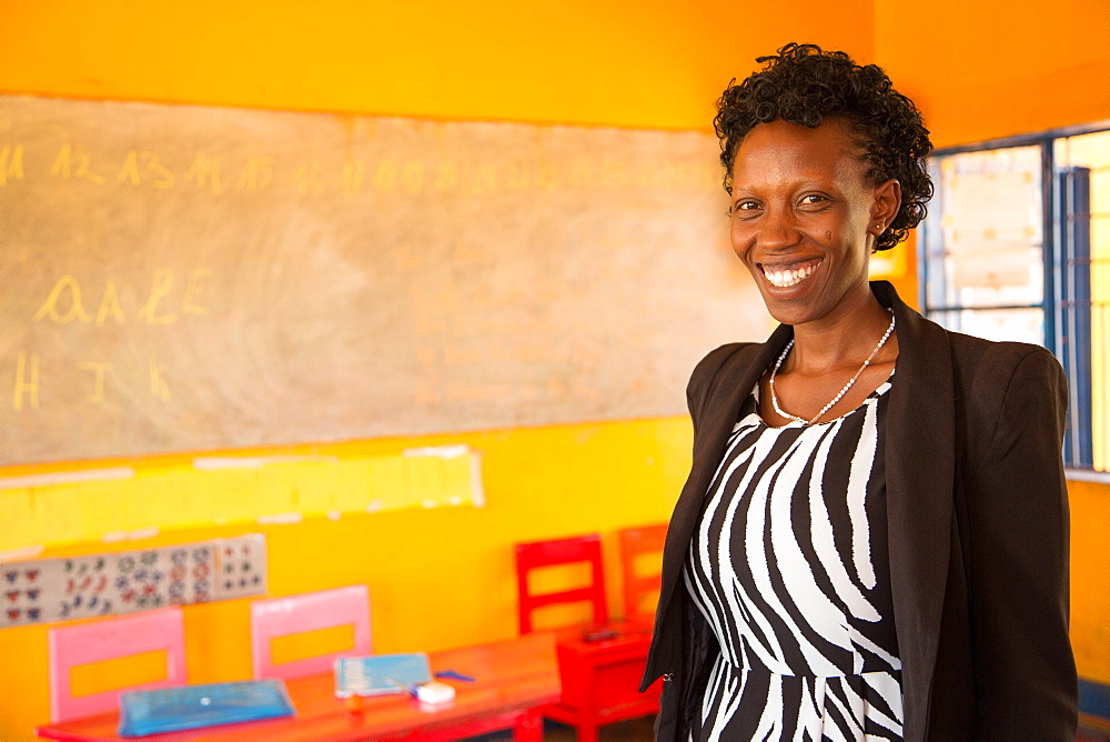 Agnes Mbvoyire, VSO national volunteer working alongside Filipino volunteer Rhea Villarico to improve standards of teaching in nursery schools in eastern Rwanda, Africa