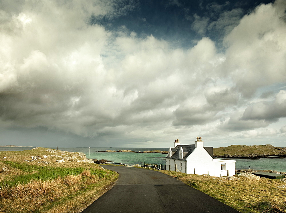 White cottage by the sea, Isle of Barra, Hebrides, Scotland, United Kingdom, Europe