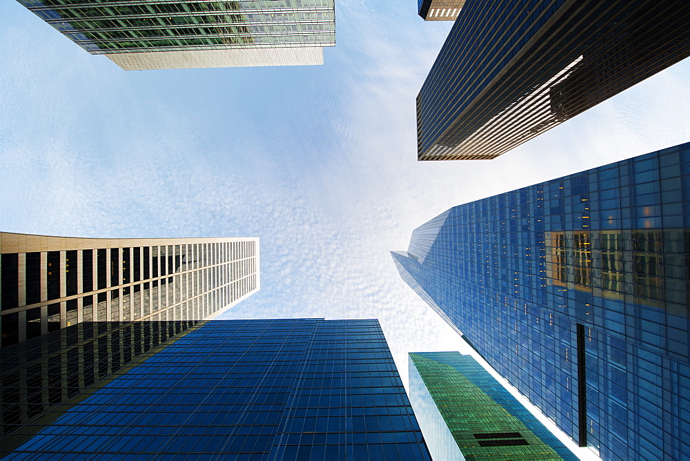 Looking up through skyscrapers, New York, United States of America, North America