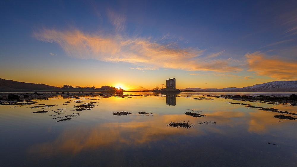 Sunset at Castle Stalker, a keep on its own island in Loch Linnhe, Argyll, Scottish Highlands, Scotland, United Kingdom, Europe