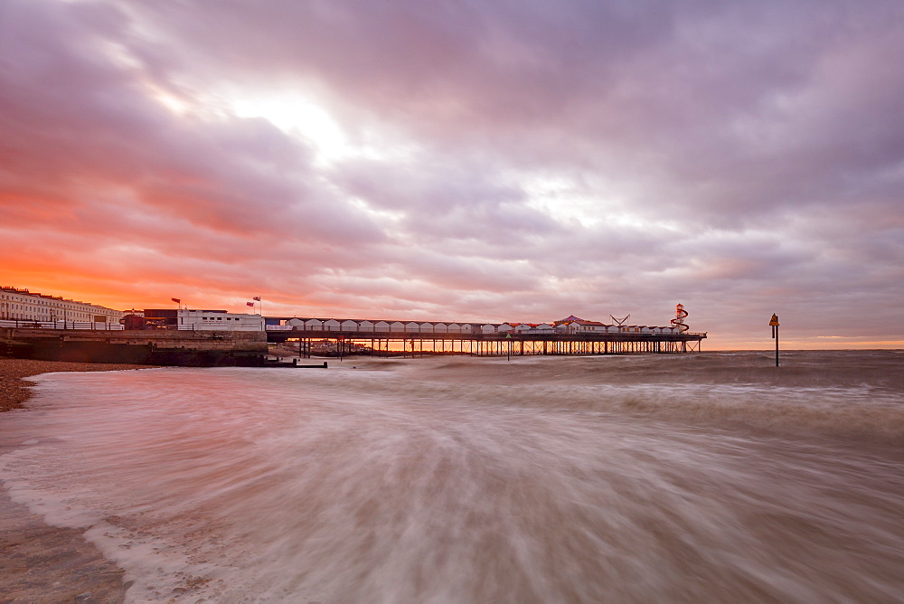 Dramatic skies over Herne Bay Pier at dusk, Herne Bay, Kent, England, United Kingdom, Europe