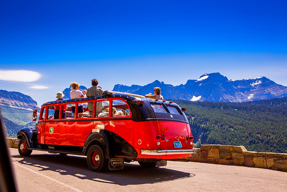 Vintage tour bus on the Sun Road, Glacier National Park, Montana, United States of America, North America