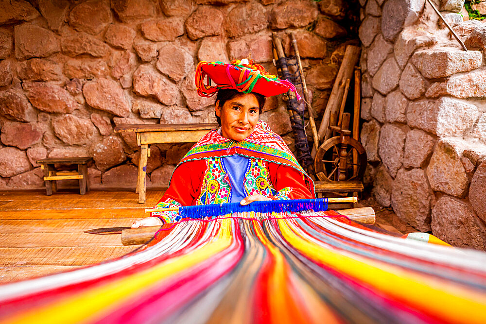 Portrait of Parobamba Quechua woman and loom, Sacred Valley, Peru, South America