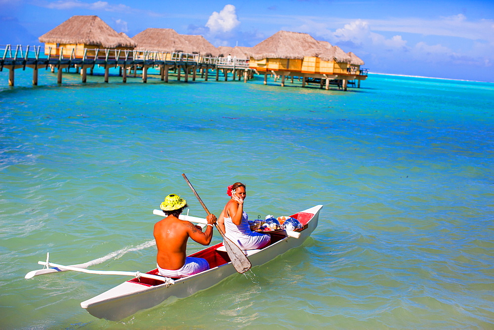 Canoe room service for the overwater bungalows, Le Taha'a Resort, Tahiti, French Polynesia, South Pacific, Pacific