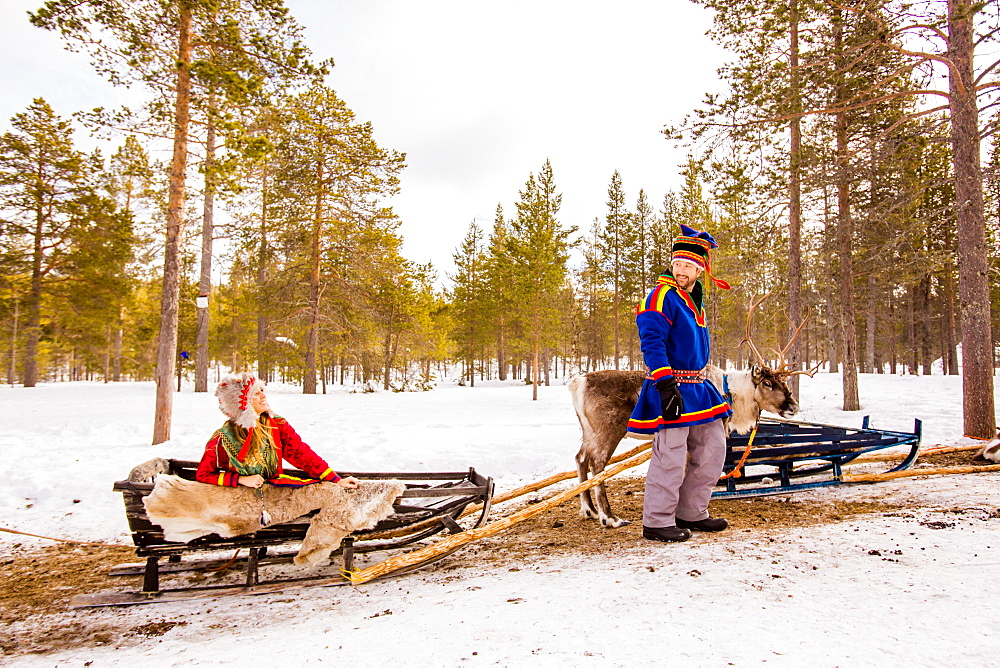 Couple wearing Traditional Sami costumes, Reindeer Safari, Kakslauttanen Igloo Village, Saariselka, Finland, Scandinavia, Europe