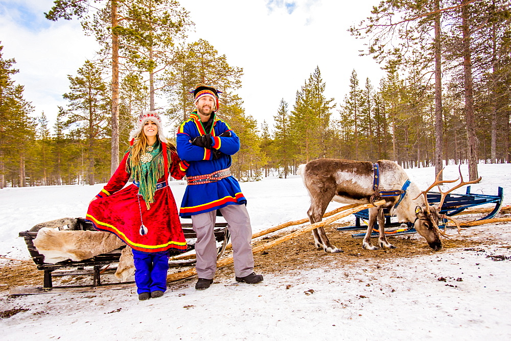 Couple wearing Traditional Sami costumes, Reindeer Safari, Kakslauttanen Igloo Village, Saariselka, Finland, Scandinavia, Europe