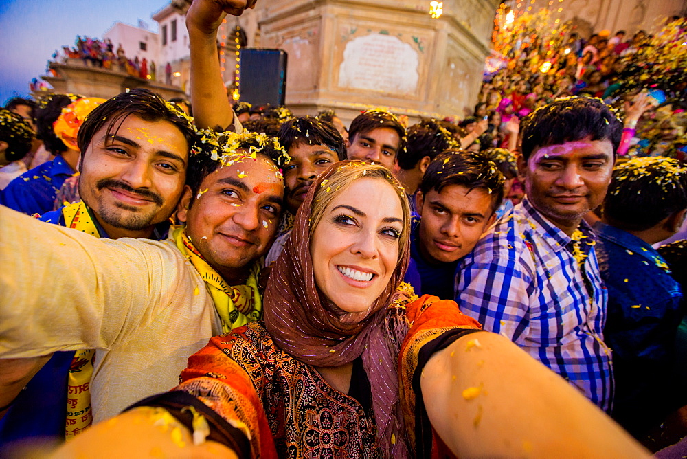 Laura Grier selfie in the crowd during the Flower Holi Festival, Vrindavan, Uttar Pradesh, India, Asia