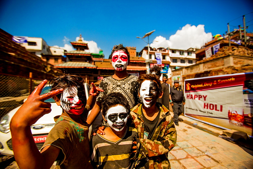 Kids with faces painted at the Holi Festival, Durbar Square, Kathmandu, Nepal, Asia